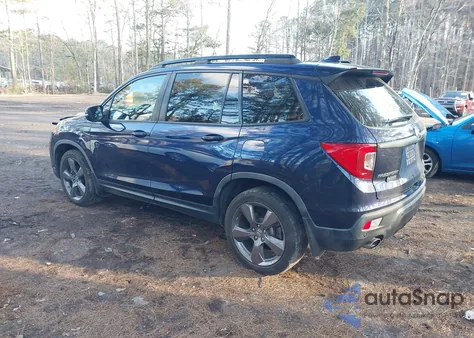 2021 Honda Passport 2Wd Touring from USA, damaged, VIN 5FNYF7H90MB006515